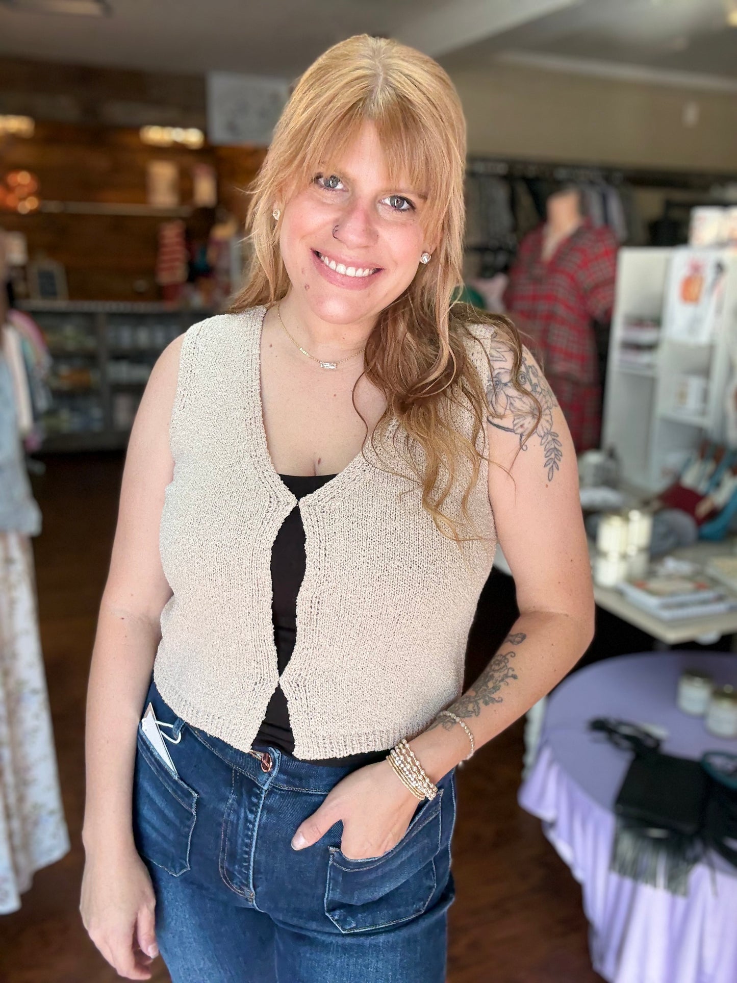 Clasp closure knit sweater vest