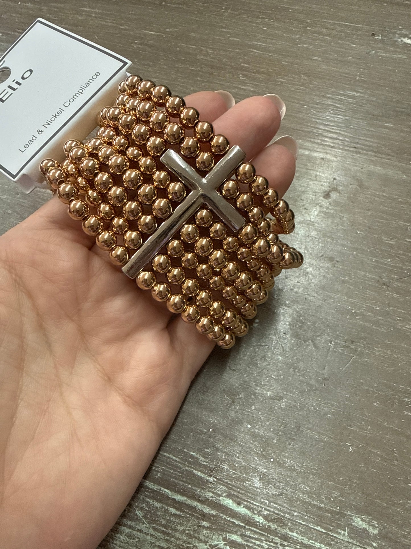 Gold beaded with cross stretch bracelet