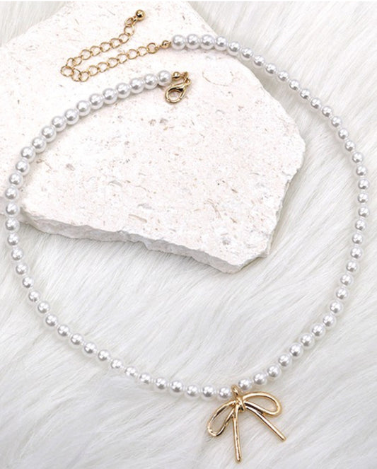 Pearl bow charm necklace