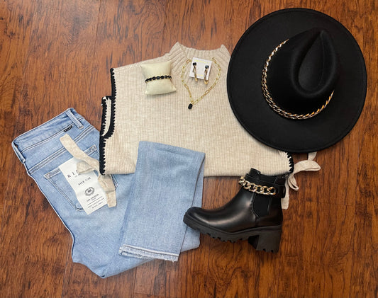 Margo Mockneck sleeveless sweater with side tie